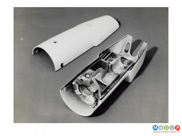 Scanned image showing a moulded steering column.