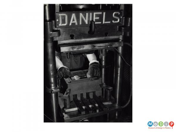 Scanned image showing a Daniels moulding press.