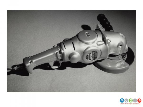 Scanned image showing an angle grinder.