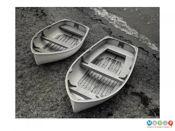 Scanned image showing two dinghies.