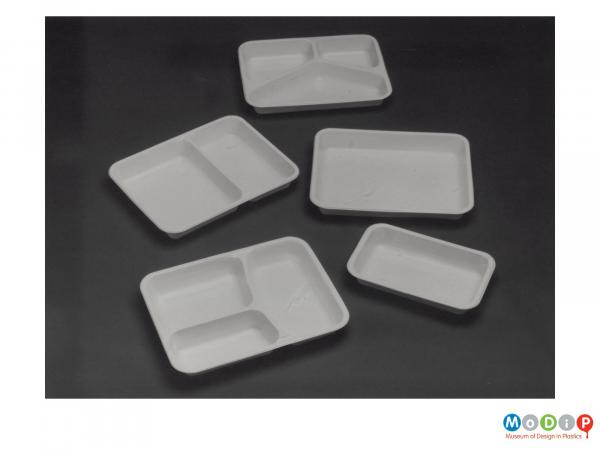 Scanned image showing empty ready meal trays.