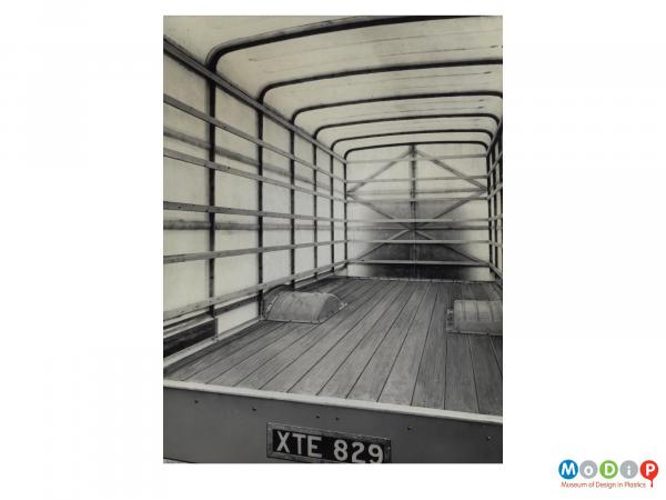 Scanned image showing the interior of a van.
