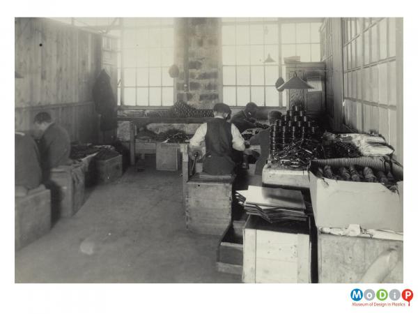 Scanned image showing the interior of a factory.