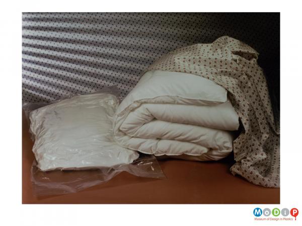 Scanned image showing packaged bedding.