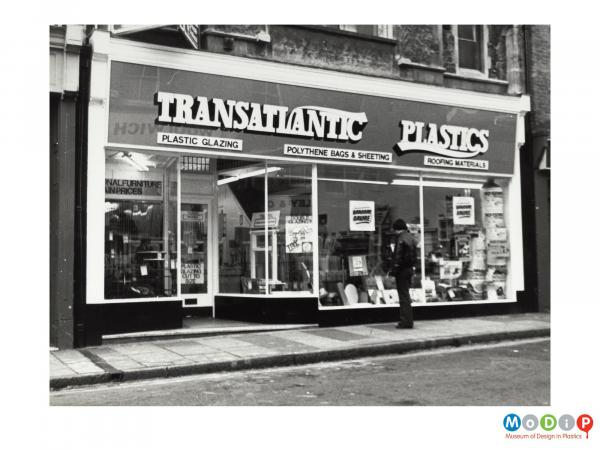 Scanned image showing a shop front.