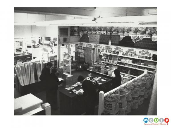 Scanned image showing a shop interior.