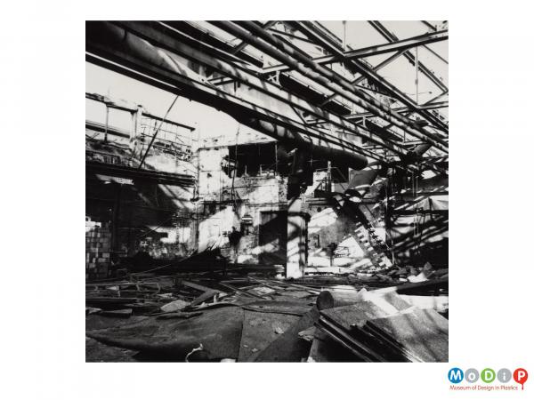 Scanned image showing the inside of an old factory building.