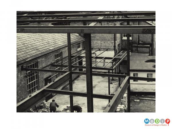 Scanned image showing building works.