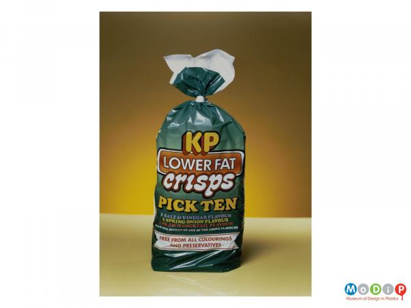 Scanned image showing a KP crisp multipack tied at the  top with adhesive tape.