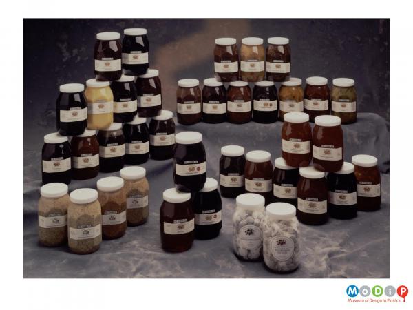 Scanned image showing a large selection of jars.