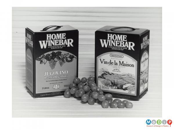 Scanned image showing two wine boxes.