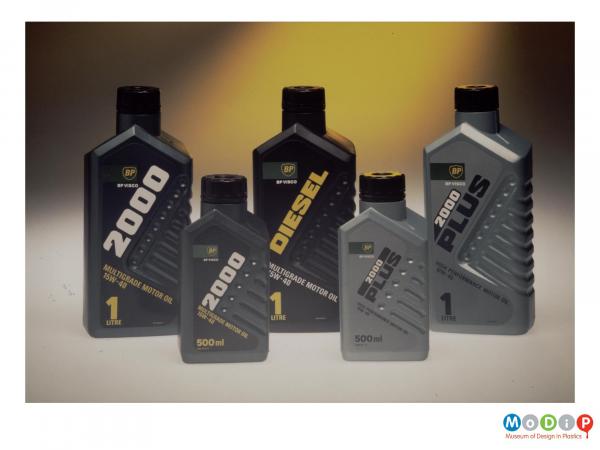 Scanned image showing a range of 5 BP motor oil bottles.