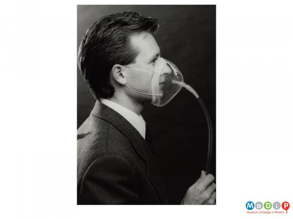 Scanned image showing a man wearing an oxygen mask.