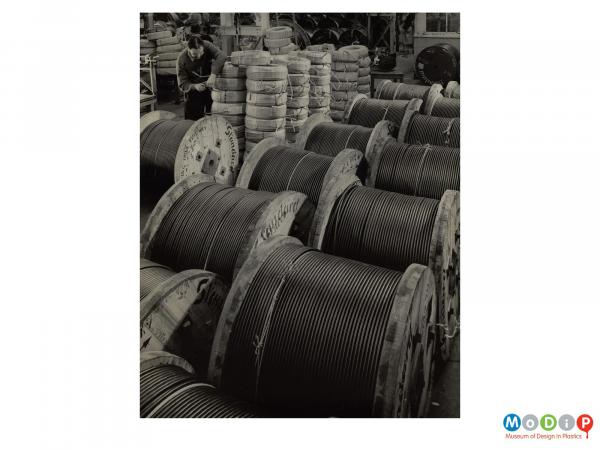Scanned image showing reels of cable.