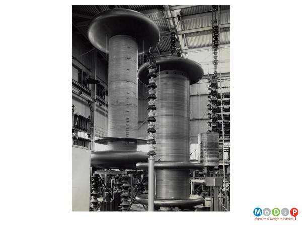 Scanned image showing 2 large high voltage induction coils.