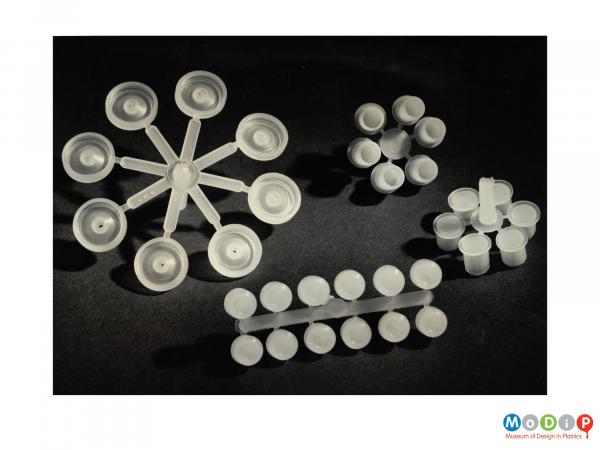 Scanned image showing injection moulded components on a sprue.