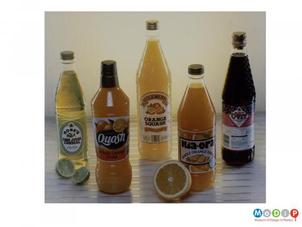 Scanned image showing a range of 5 squash bottles.