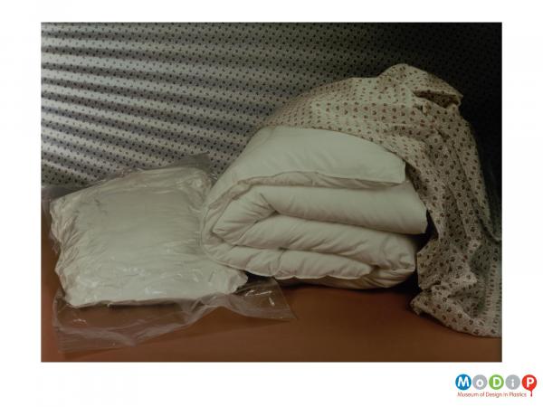 Scanned image showing a vacuum packed pillow.