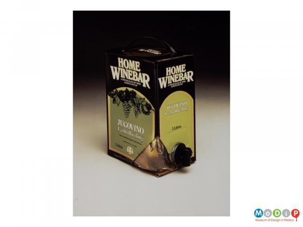 Scanned image showing wine box with the corner cut away to expose the bag inside.