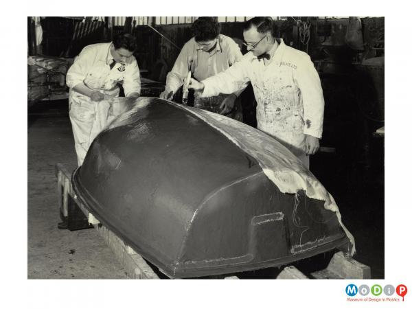 Scanned image showing the construction of a small boat.