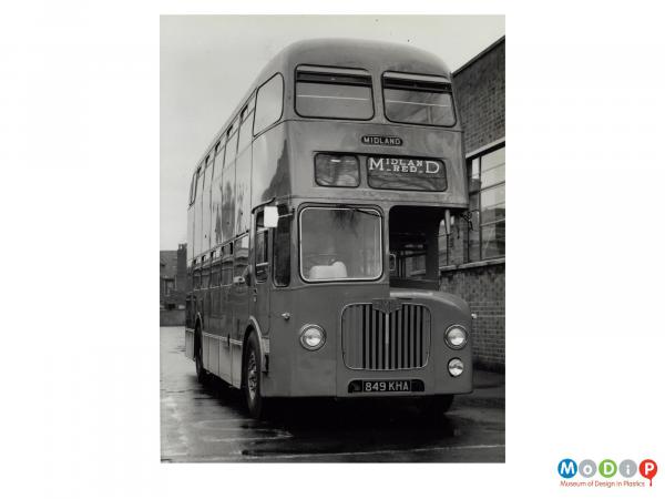Scanned image showing a double decker bus.