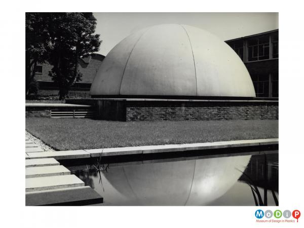 Scanned image showing the exterior of a planetarium dome.
