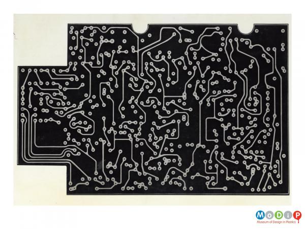 Scanned image showing a printed circuit board.