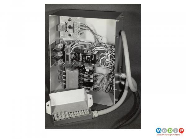 Scanned image showing a printed circuit board in a oil firing unit.