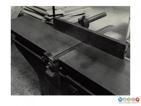 Scanned image showing a bench mounted planer.