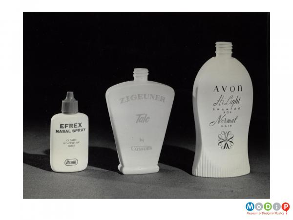 Scanned image showing a range of 3 toiletries bottles.