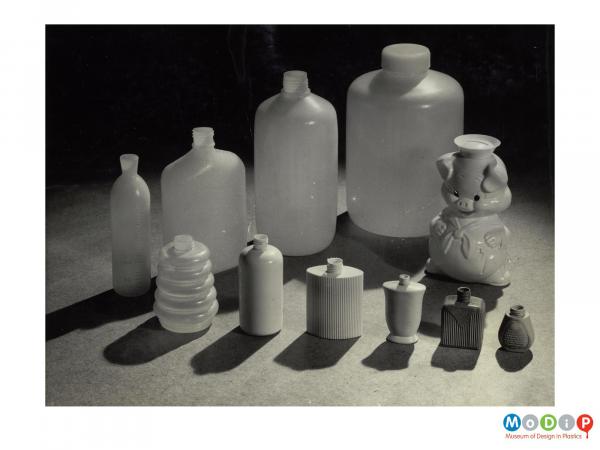 Scanned image showing a range of 11 bottles.