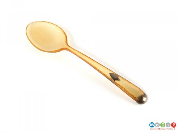 Top view of a spoon showing the bowl and handle.