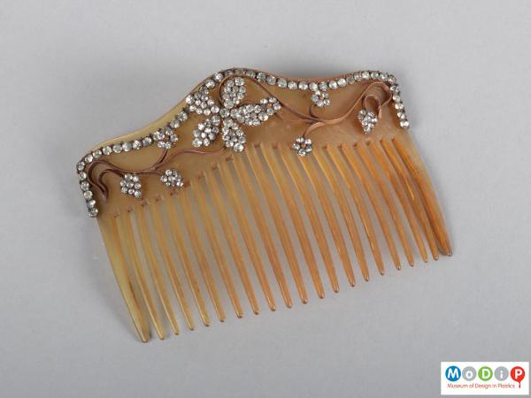 Top view of a comb showing the heading and teeth.