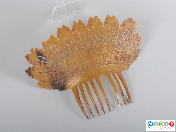 Top view of a comb showing the heading and teeth.