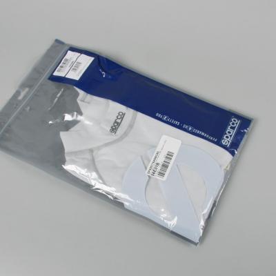 Front view of the packaging of an undershirt.