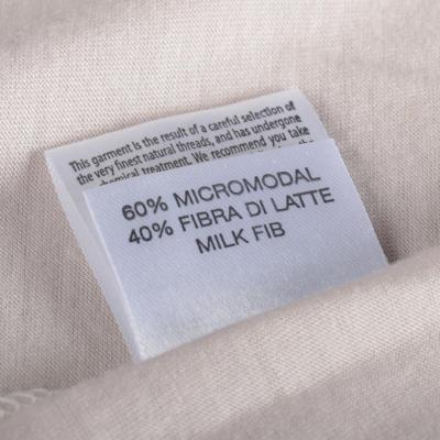 Close view of a label in the neck of a roll neck jumper.