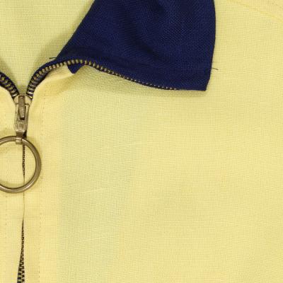 Close view of the fabric near the collar.