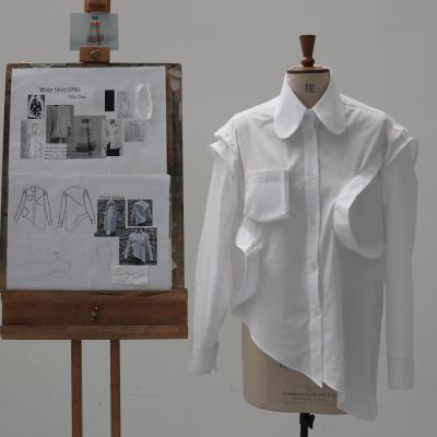 A shirt with boxy pockets of different sizes and shapes.