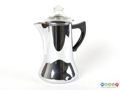 Side view of a Swan brand coffee pot showing the glass top and plastic handle.