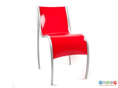 Side view of a PFE chair showing its curved form.