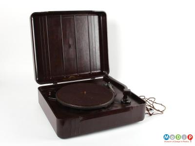 Side view of a record player showing the turntable.