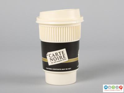 Side view of a disposable coffee cup showing the heat insulating ridges.