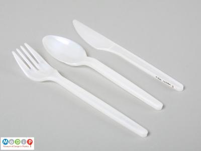 Top view of a disposable cutlery set showing the straight handles.