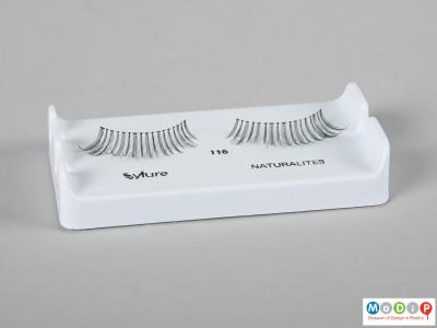 Front view of a pair of false eyelashes showing the naturally curled lashes.