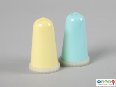 Side view of a cruet set showing the conical shape.