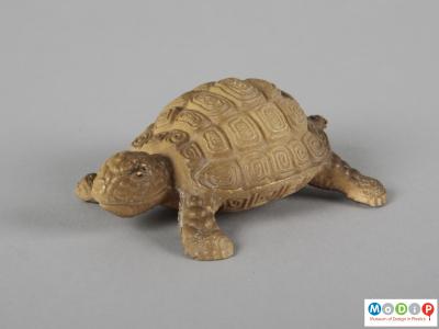 Side view of a toy showing the moulded patterning on the shell.