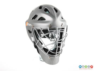 Front view of a hockey helmet showing the face grill.