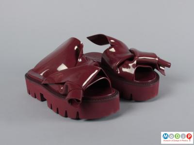 Front view of a pair of shoes showing the open toes.
