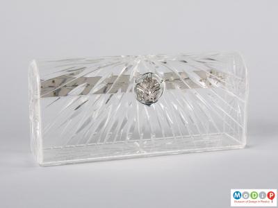 Front view of a clutch bag showing the cut glass style design.